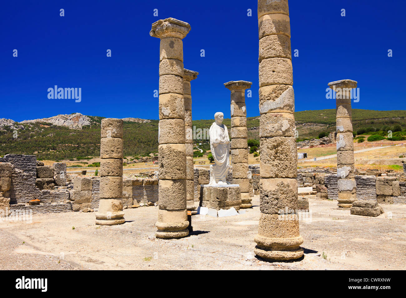 Trajan statue and Basilica at the Roman ruins of Baelo Claudia in Bolonia beach , Tarifa , Cadiz , Andalusia , Spain Stock Photo