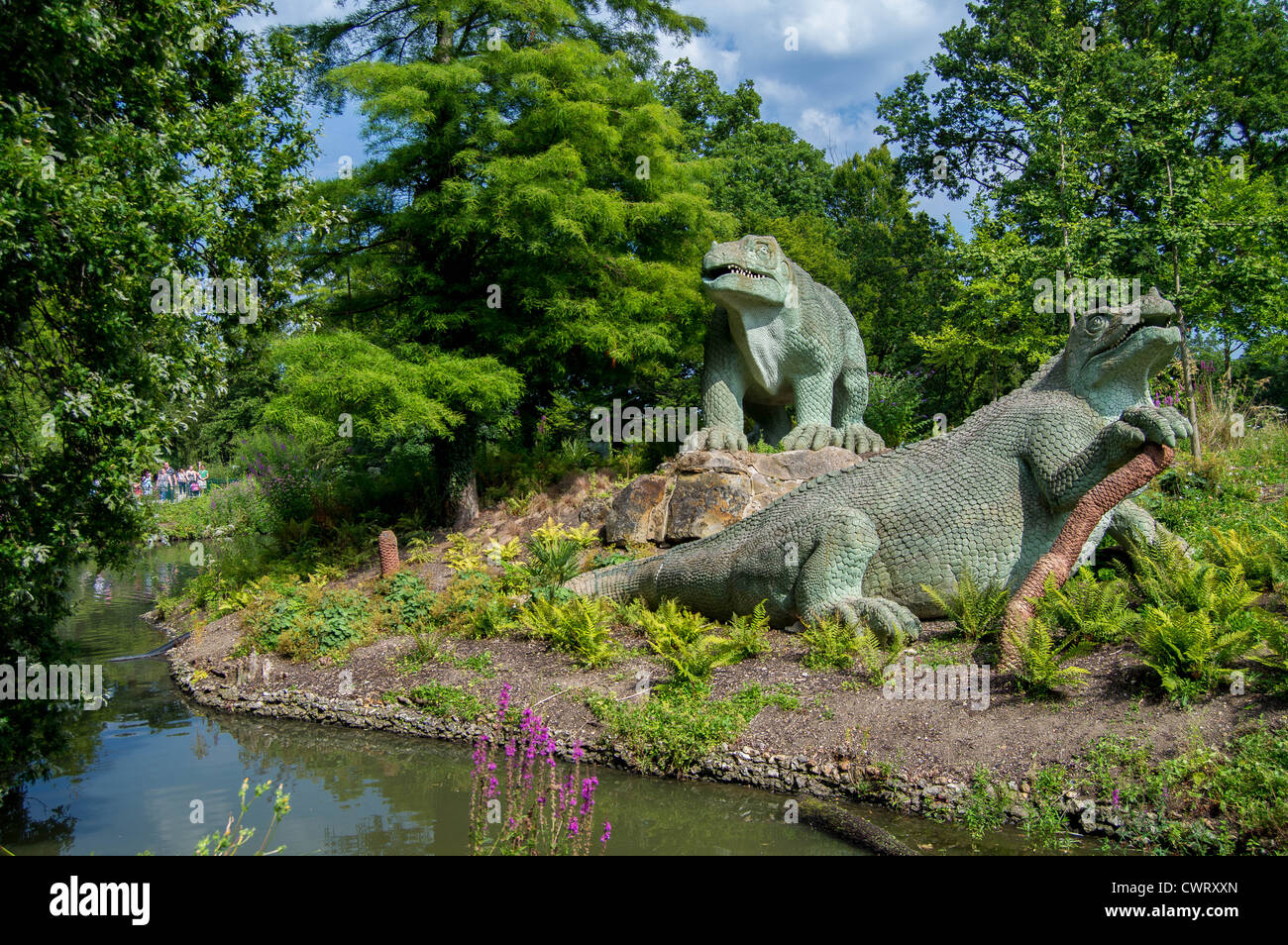 Iguanodons – Crystal Palace Park dinosaurs by sculptor Benjamin Waterhouse Hawkins Stock Photo