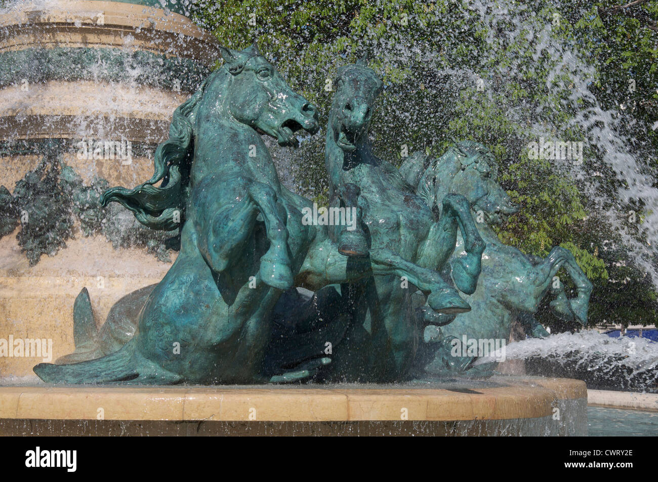 Fountains. Galloping horses charge through the water jets of the