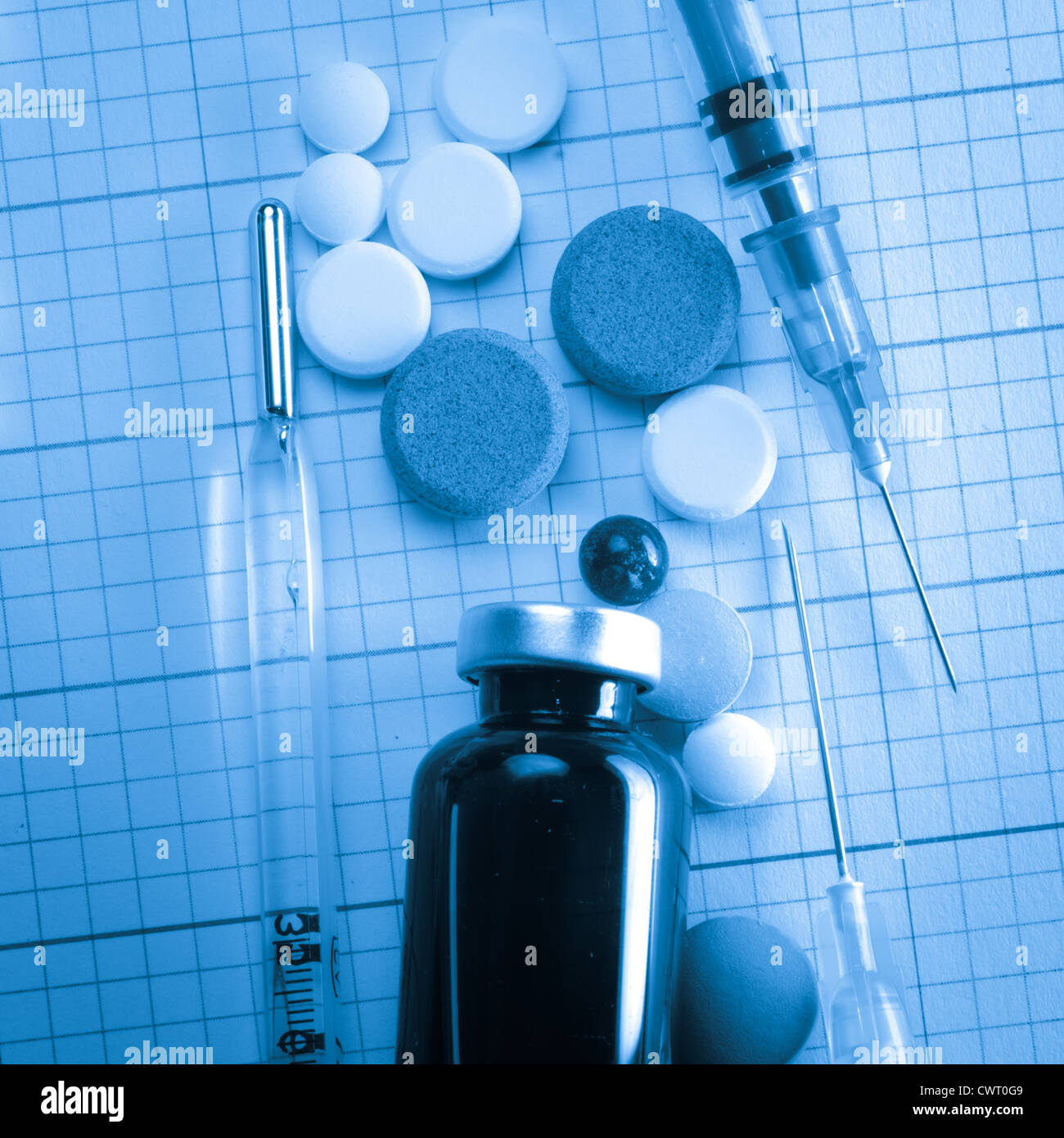 Packs of different medical bottle and syringe background Stock Photo