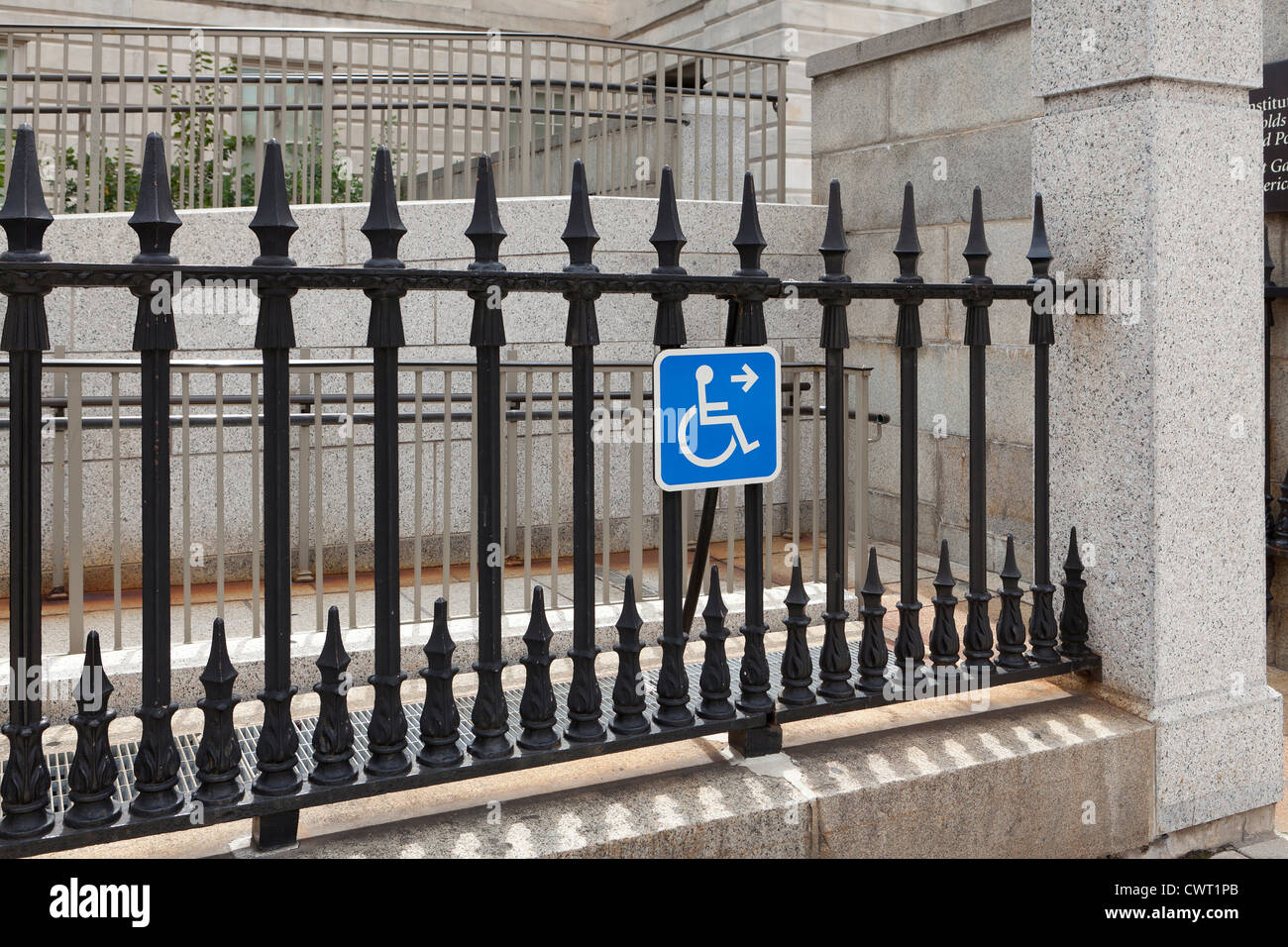 Disabled entry sign on fence Stock Photo