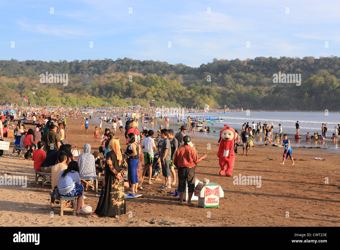 Teletubby Po on the beach in Pangandaran, West Java. Stock Photo