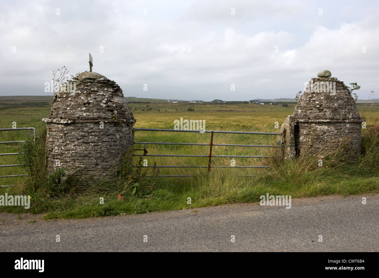 traditional round stone pillars field gate openings scotland uk Stock Photo