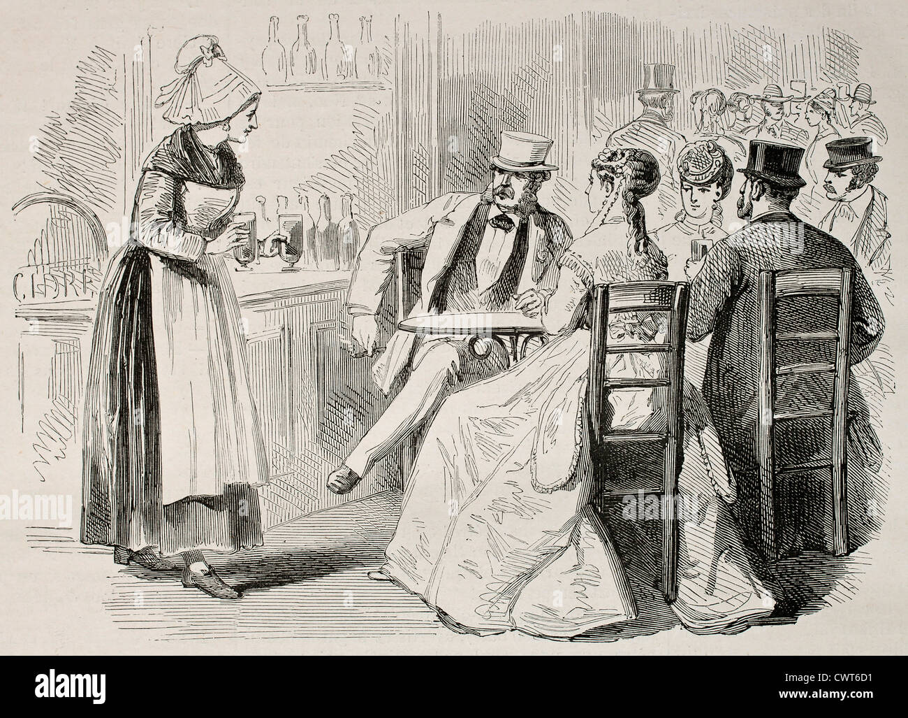 Waitress attending to customers in a bar Stock Photo