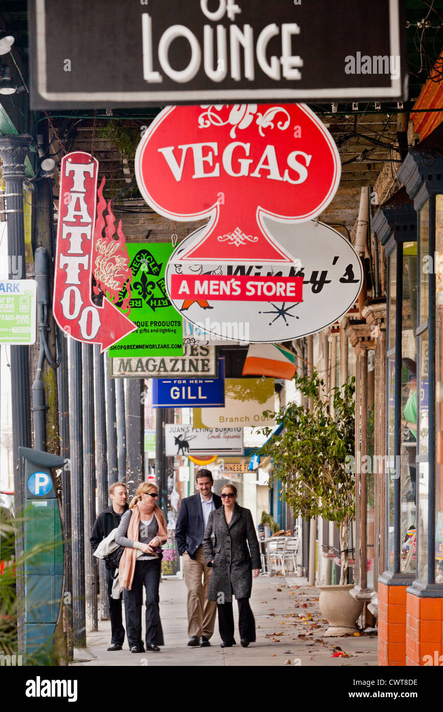 Stores and shoppers on Magazine Street in Garden District of New Orleans, Louisiana Stock Photo