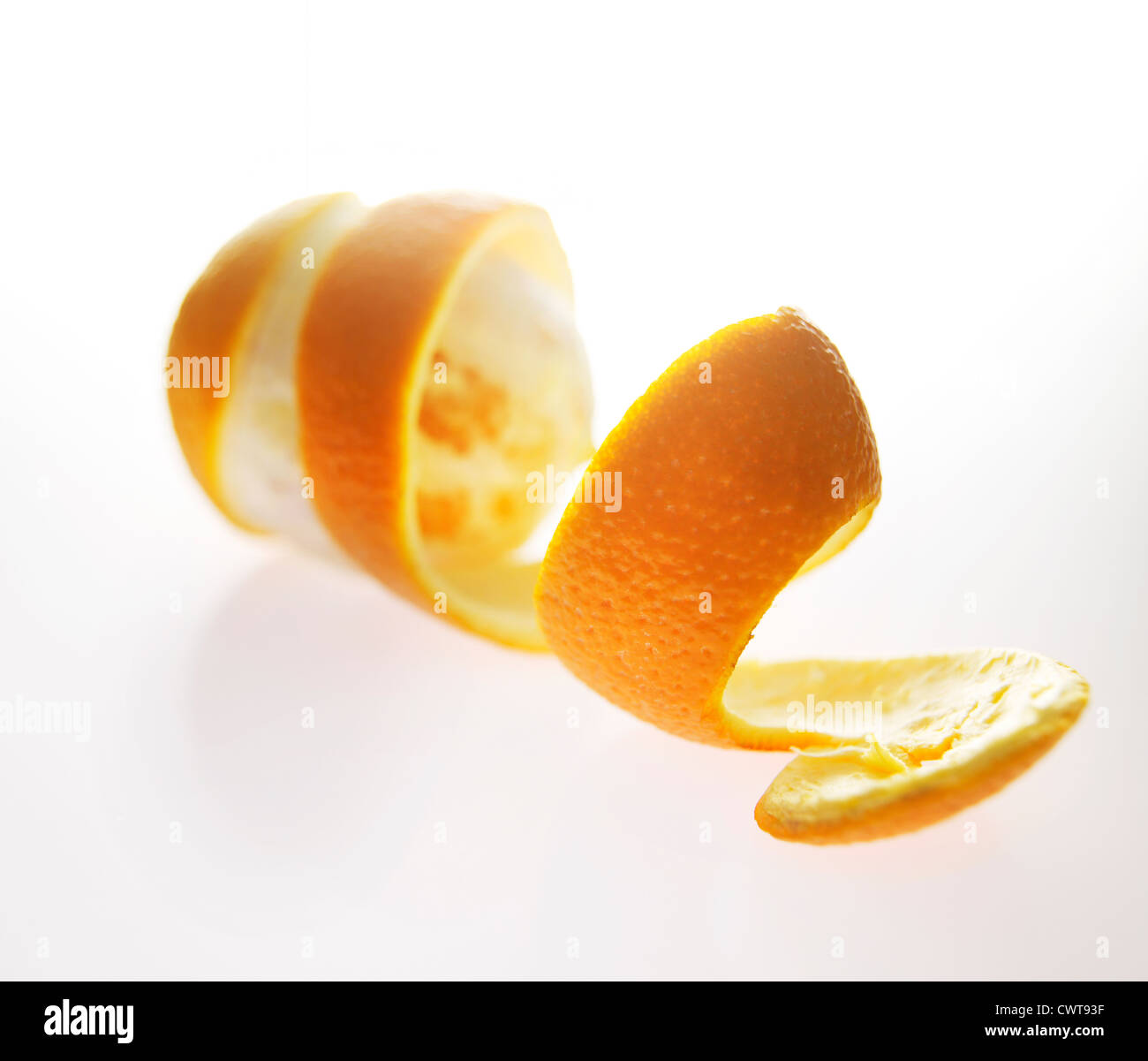 Orange peel spiral and fruit Stock Photo