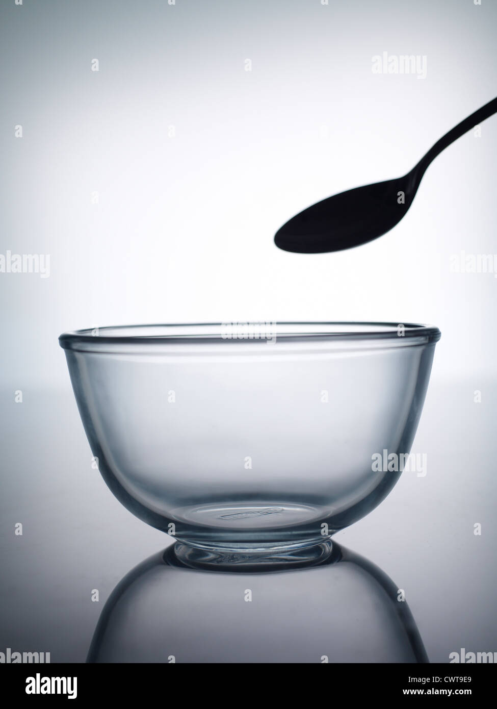 Bowl and spoon Stock Photo