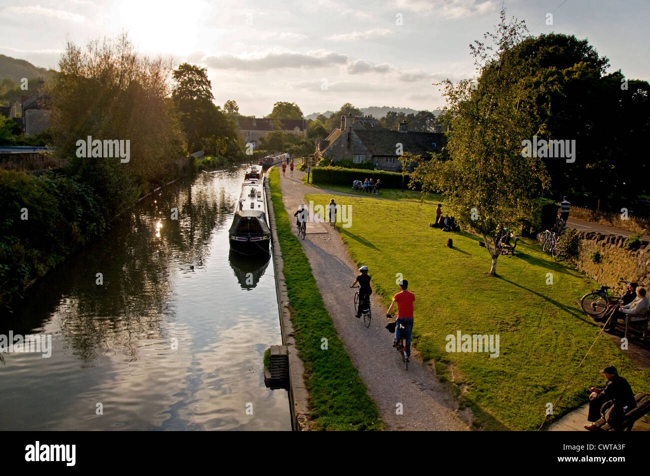 Sunday afternoon walking and cycling on towpath by Kennet and Avon canal at Bathampton Stock Photo