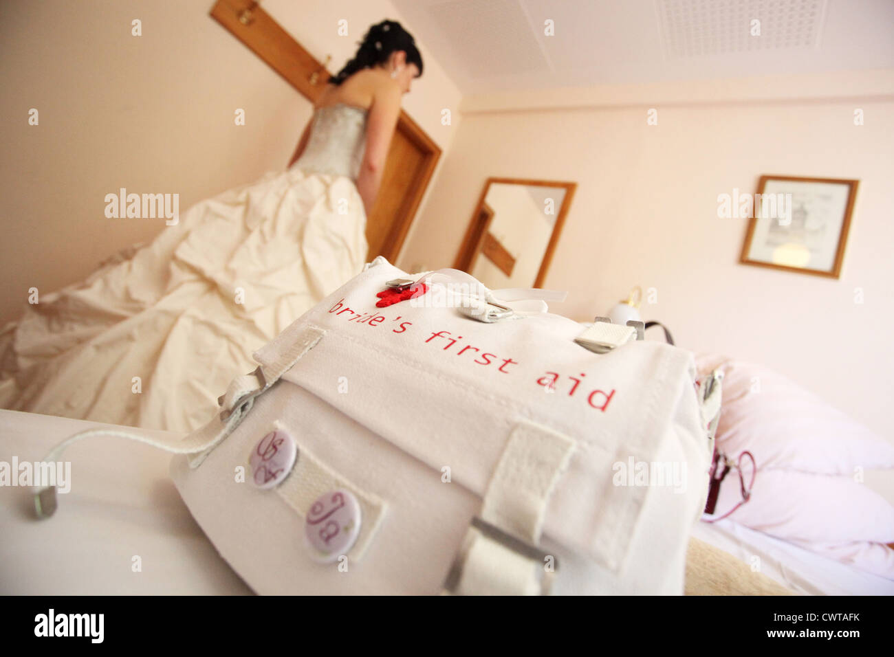 Bride with handbag in a room Stock Photo Alamy