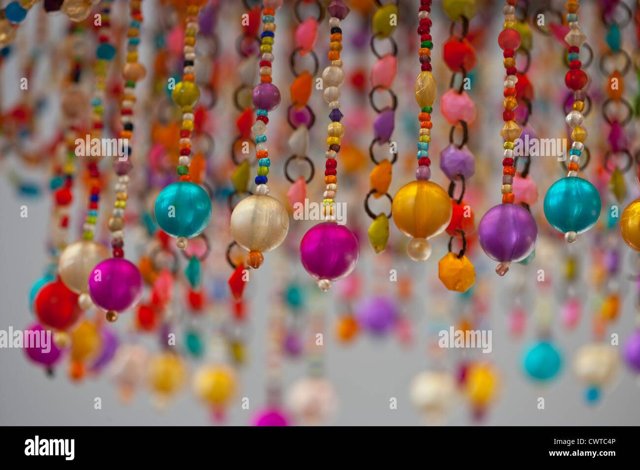 brightly coloured beads as a lampshade Stock Photo