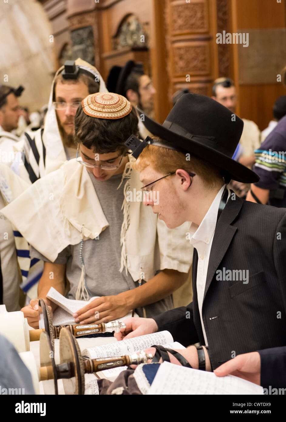 Jewish man prays in the Wailing wall during the Jewish holiday of Tisha