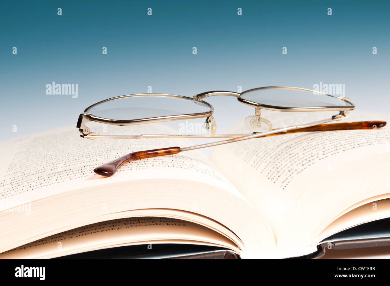 reading glasses and book Stock Photo