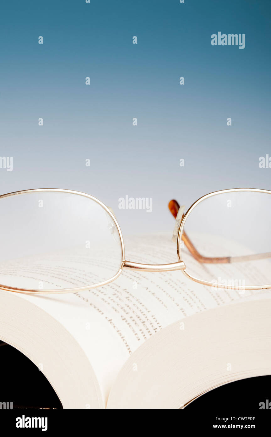 reading glasses and book Stock Photo
