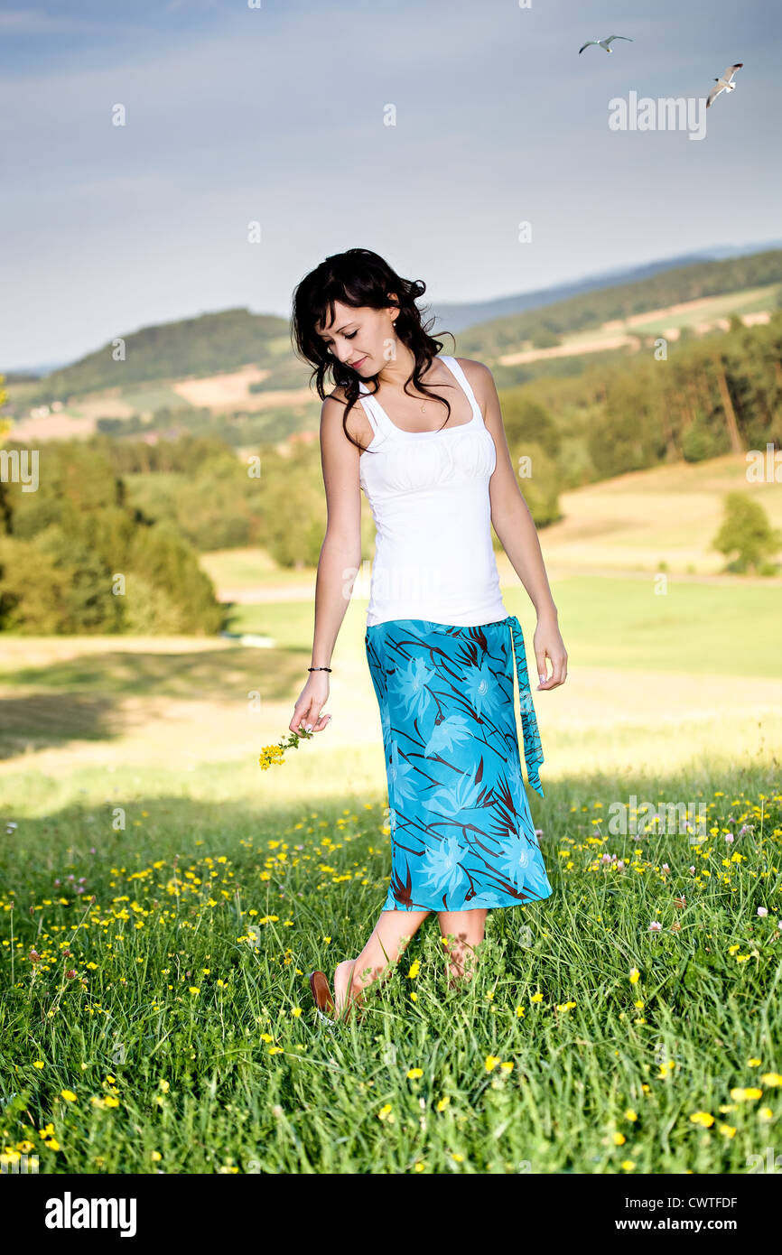 an outdoor portrait of a young woman Stock Photo