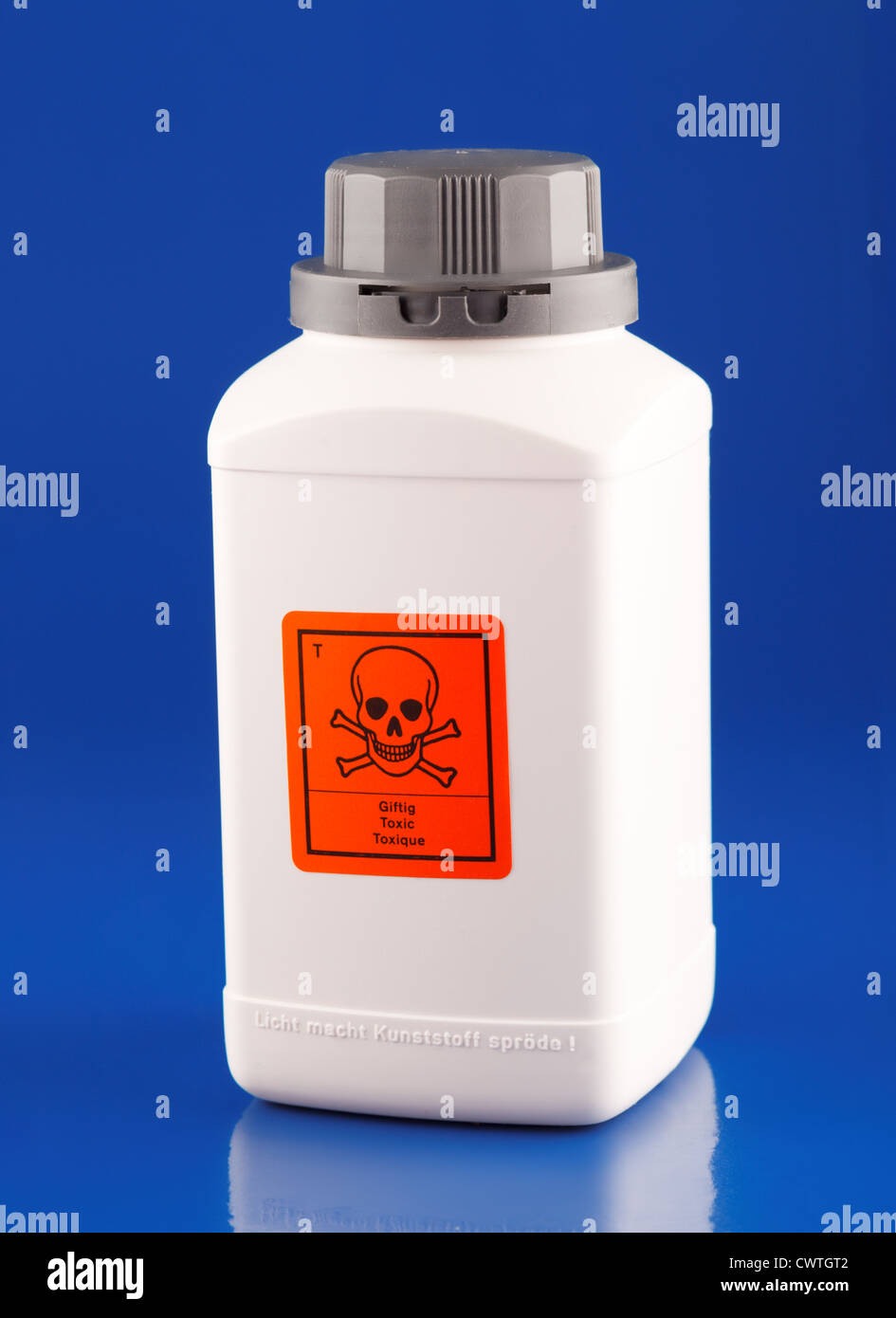 Dangerous substance in a plastic container on laboratory table Stock