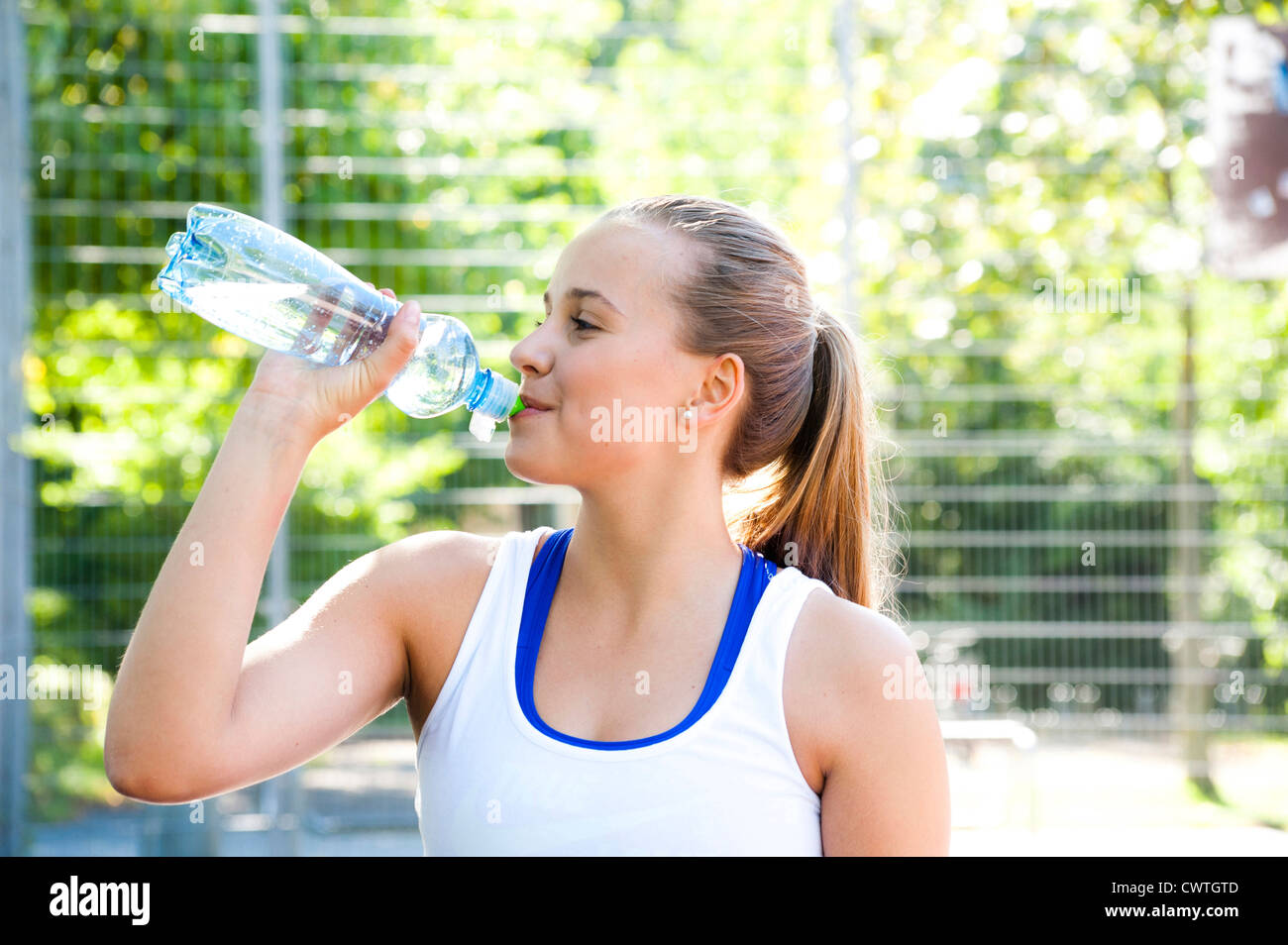 Teen drinking bottle water hi-res stock photography and images - Alamy