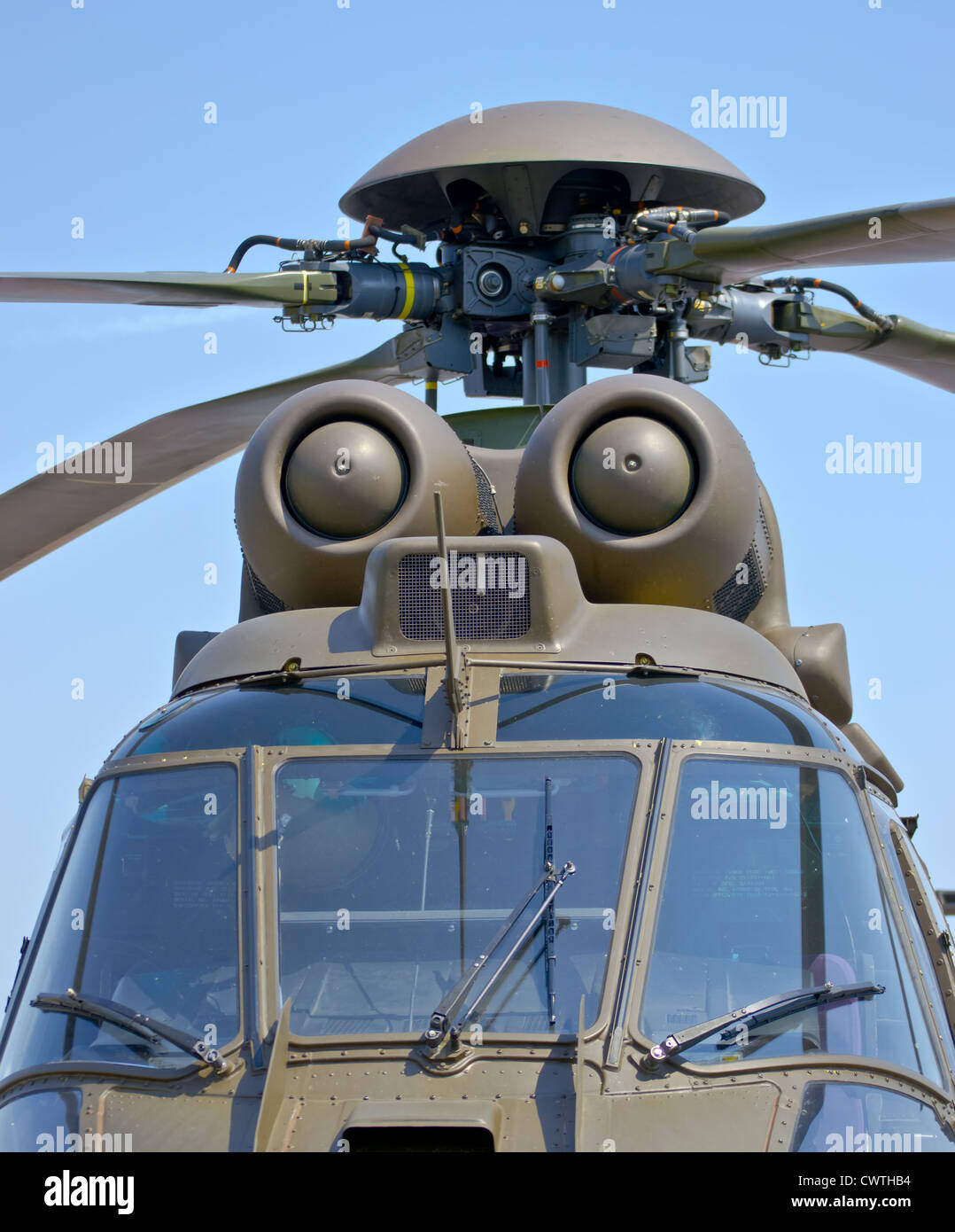 Close up front view of a military helicopter rotor hub and blades Stock Photo
