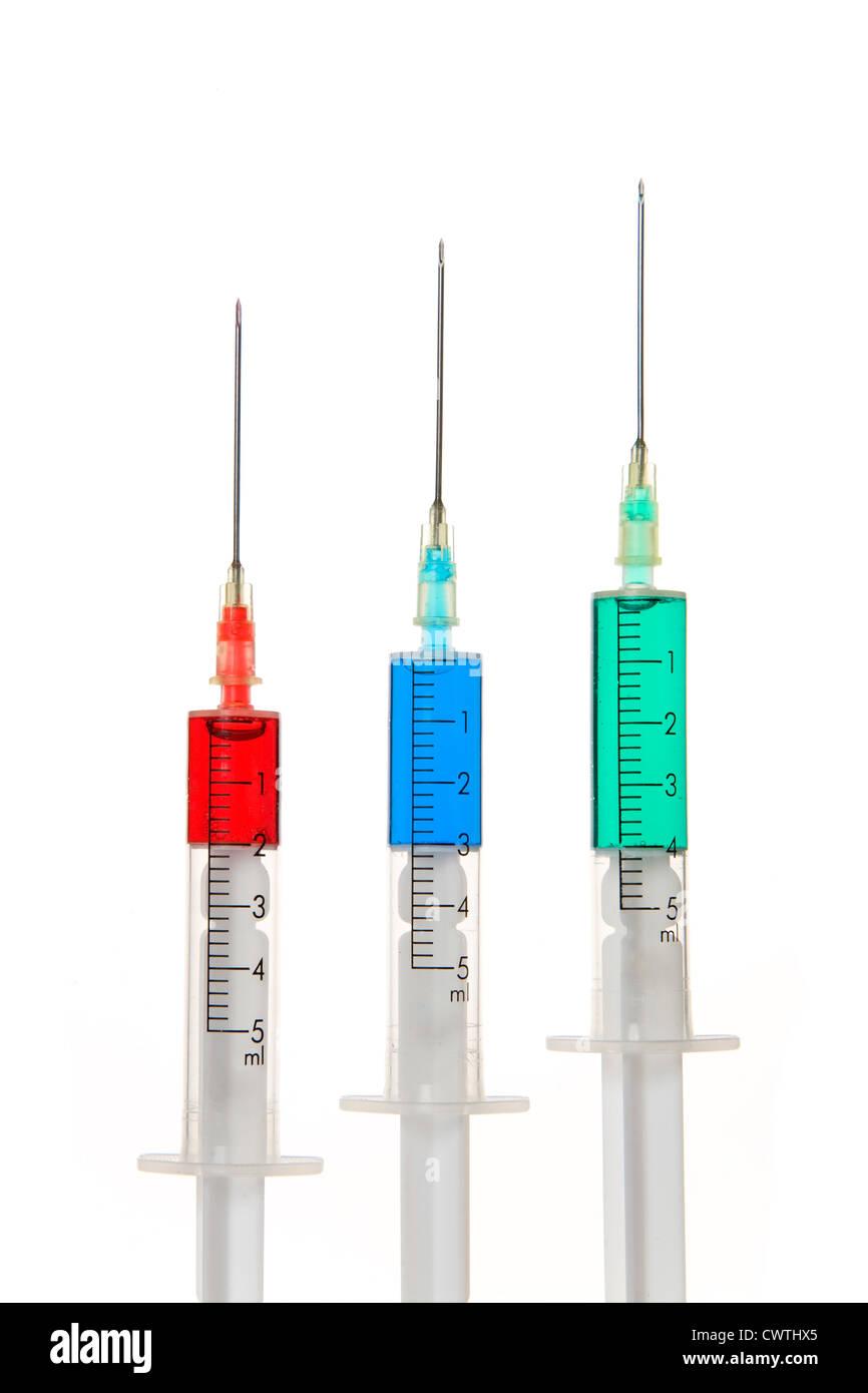 Three syringes with liquid Stock Photo Alamy