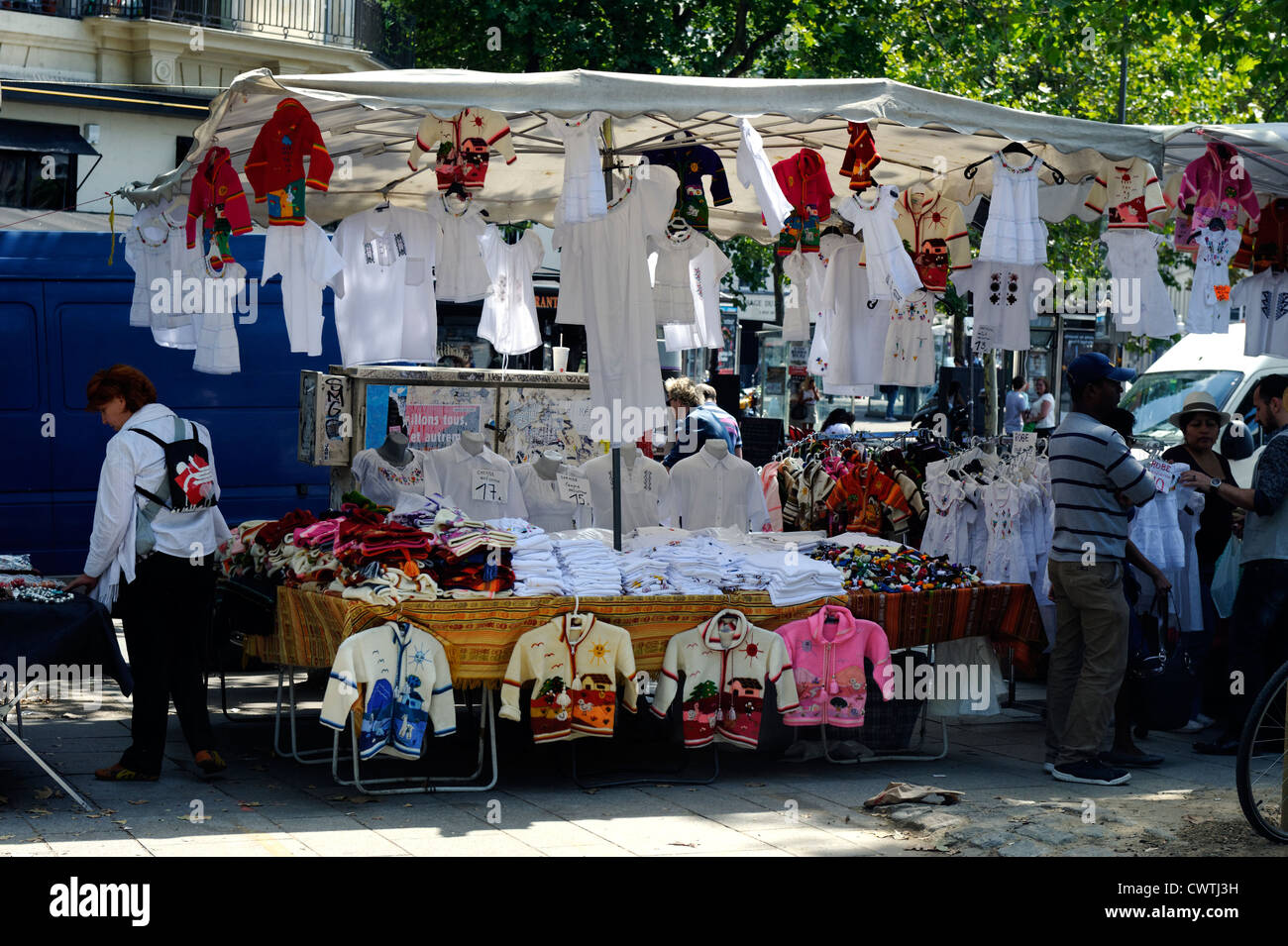 Stall selling children's clothes in a Paris market Stock Photo Alamy