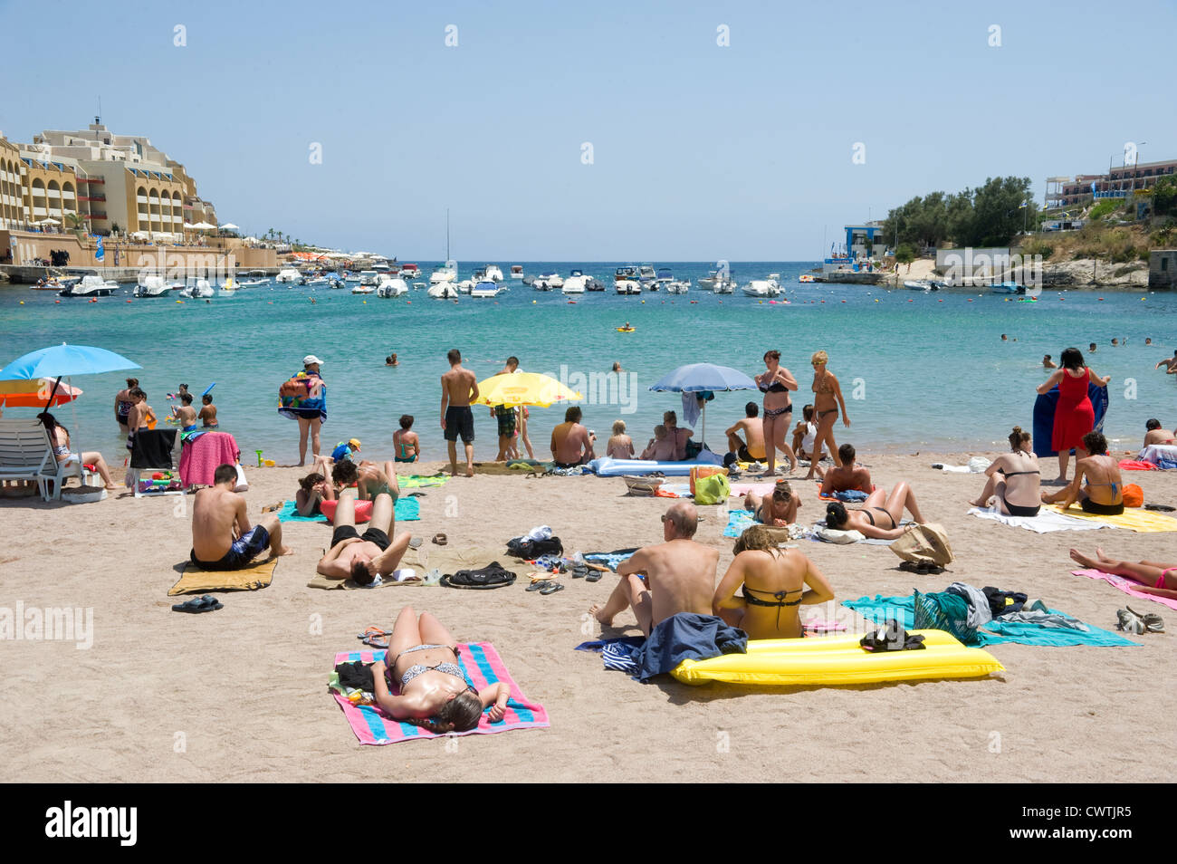 The beach at St Georges Bay near St Julians Malta Stock Photo