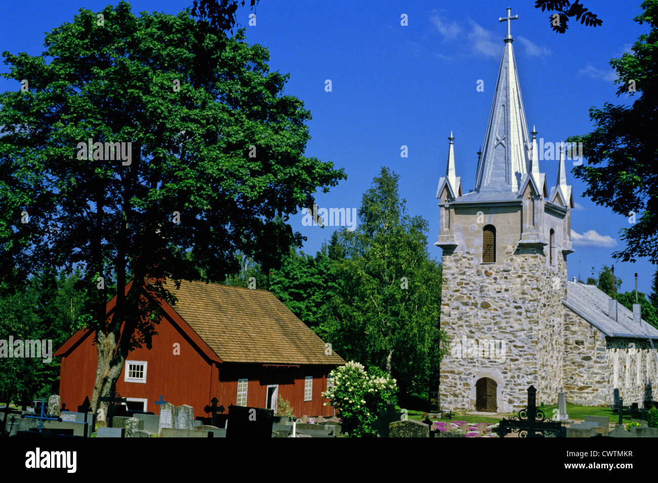 Sacrifice Church of Pyhamaa built in the 1629 and Uusi Kirkko (New Church) in Pyhamaa, Finland Stock Photo