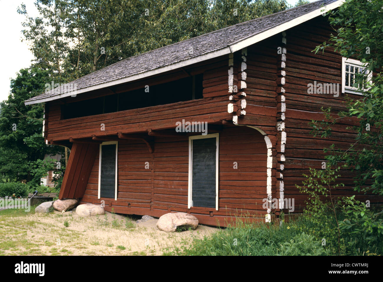 Old log house by the Church of St. Lawrence in Vantaa, Finland Stock Photo