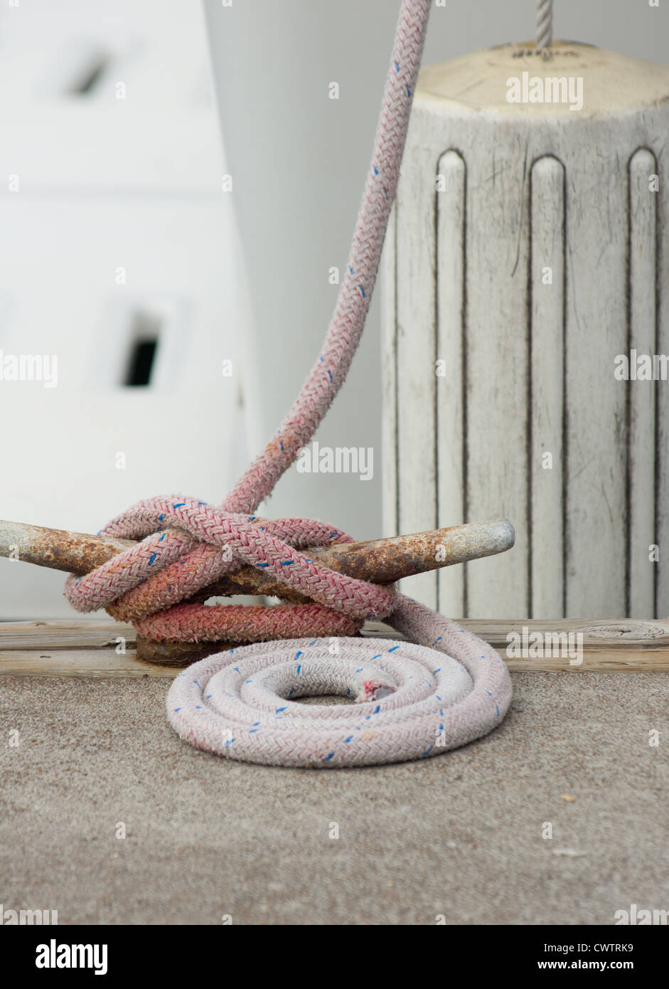White boat fenders and dock line attached to boat Stock Photo Alamy