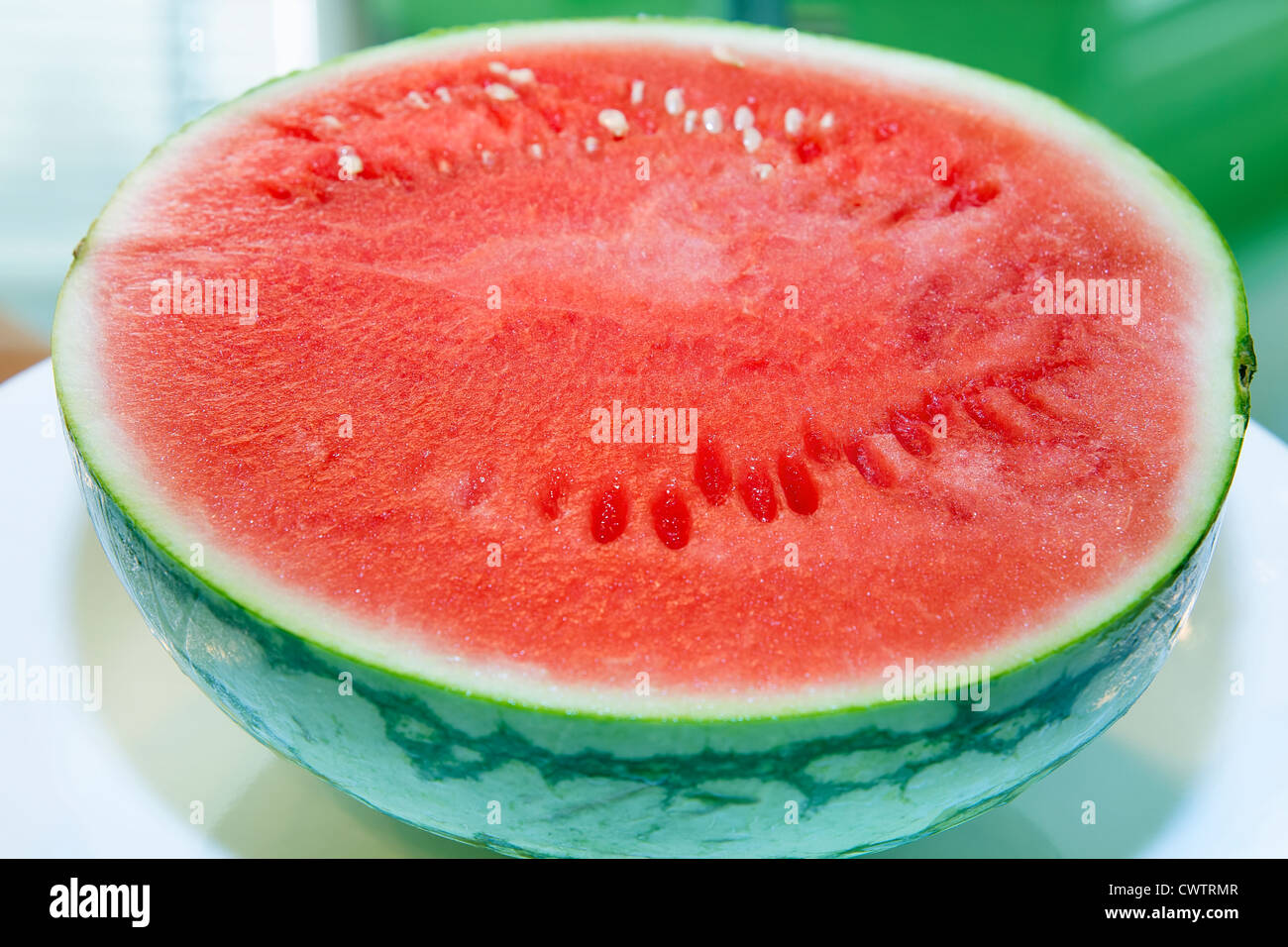 Organic Mini Seedless Watermelon Cut in Half Closeup Macro Stock Photo