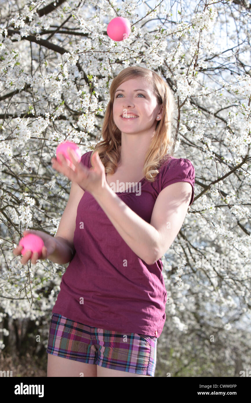 Woman juggling balls hires stock photography and images Alamy