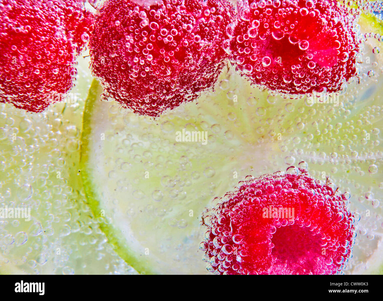 Yellow raspberries in transparent hi-res stock photography and images ...