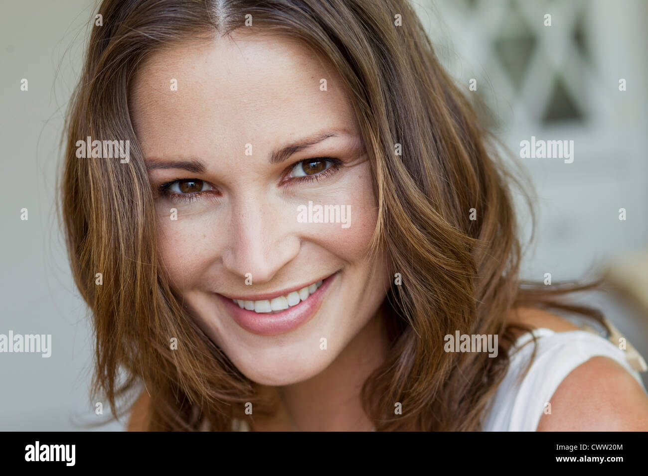Close up of womans smiling face Stock Photo - Alamy