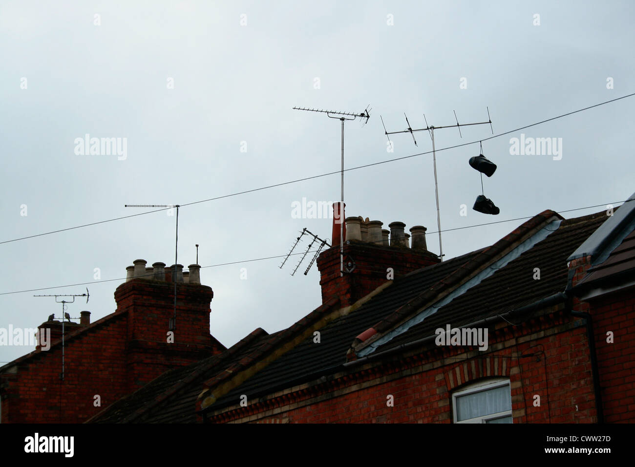 Sneakers hanging telephone wire hires stock photography and images Alamy
