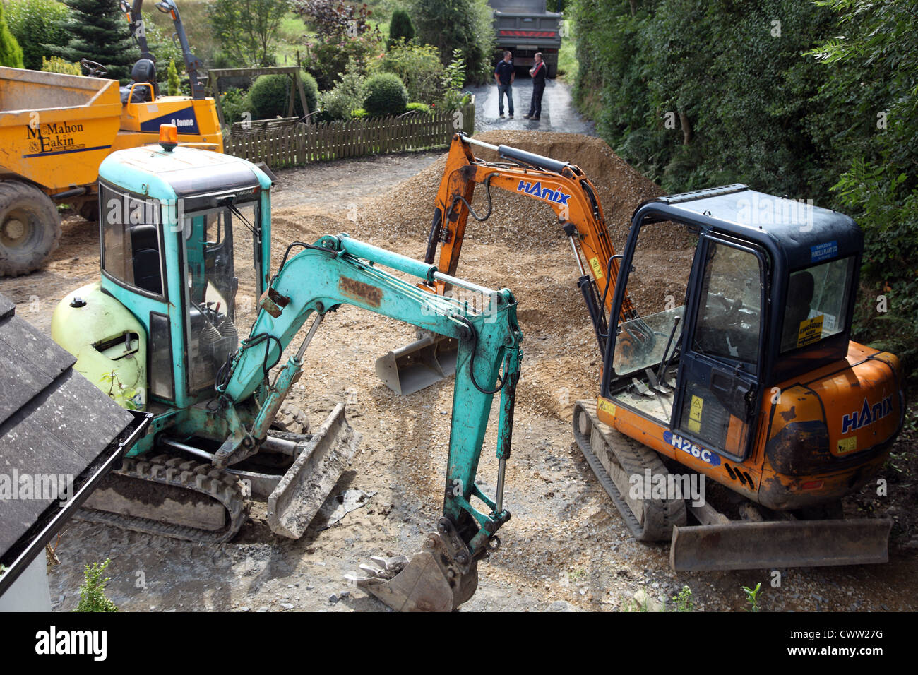 Heavy machinery used to re-gravel an Irish farmyard, Ireland Stock Photo