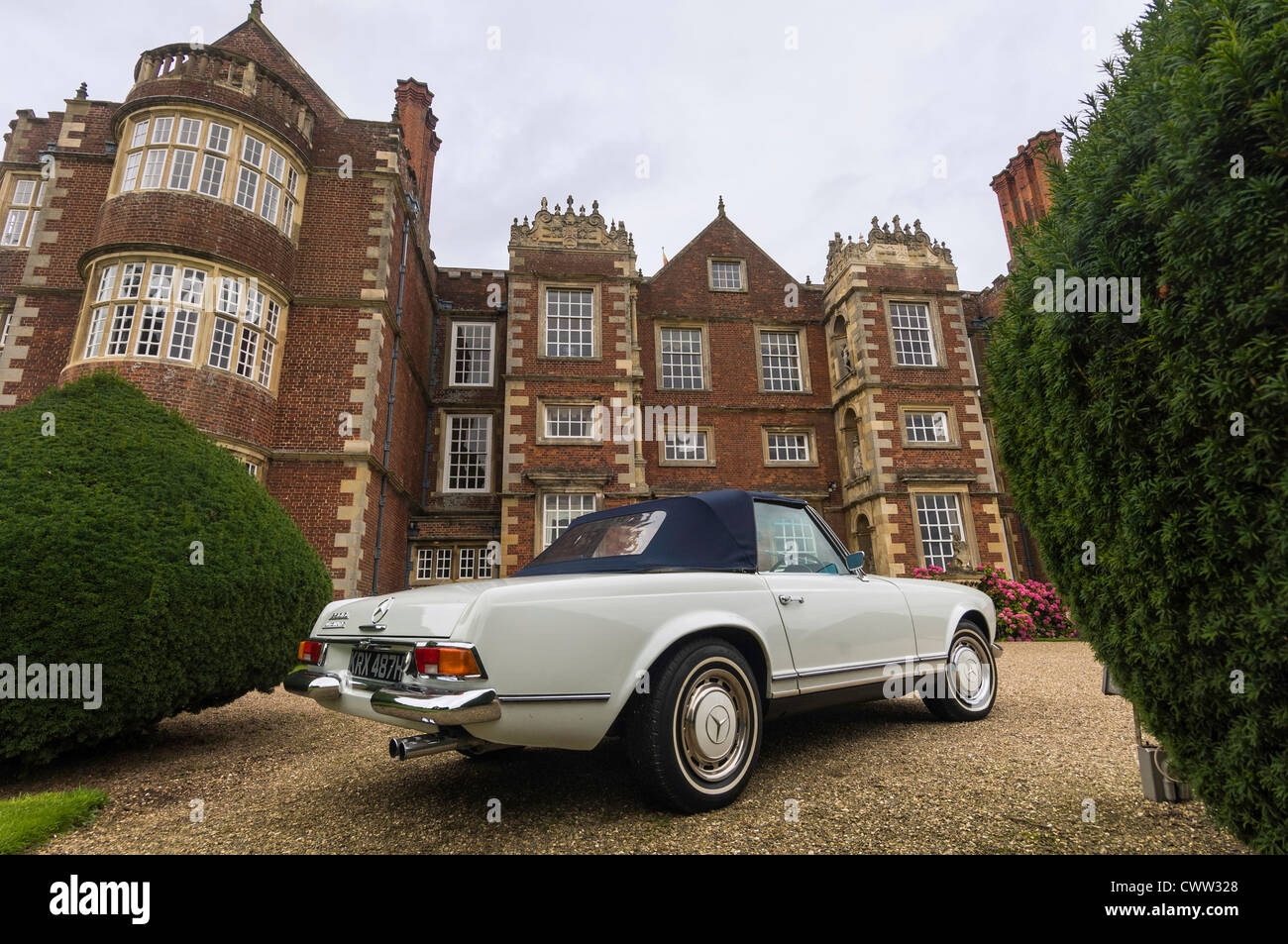 1969 Mercedes 280SL convertible in front of Burton Agnes Hall, Yorkshire Stock Photo