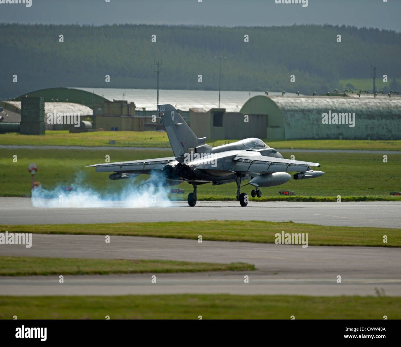 RAF Panavia GR4 Tornado on touchdown at Lossiemouth Air Base,  Moray, Grampian Region. Scotland.  SCO 8354 Stock Photo