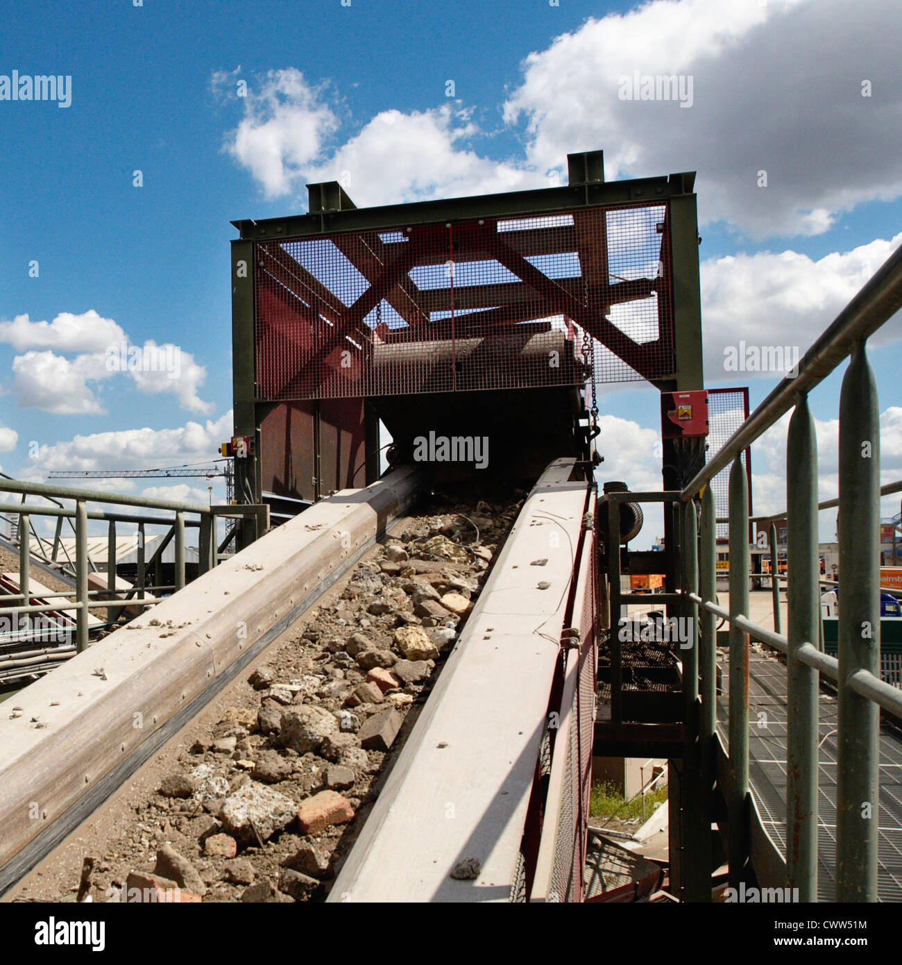 Rubble on a conveyor belt at a construction materials and recycling
