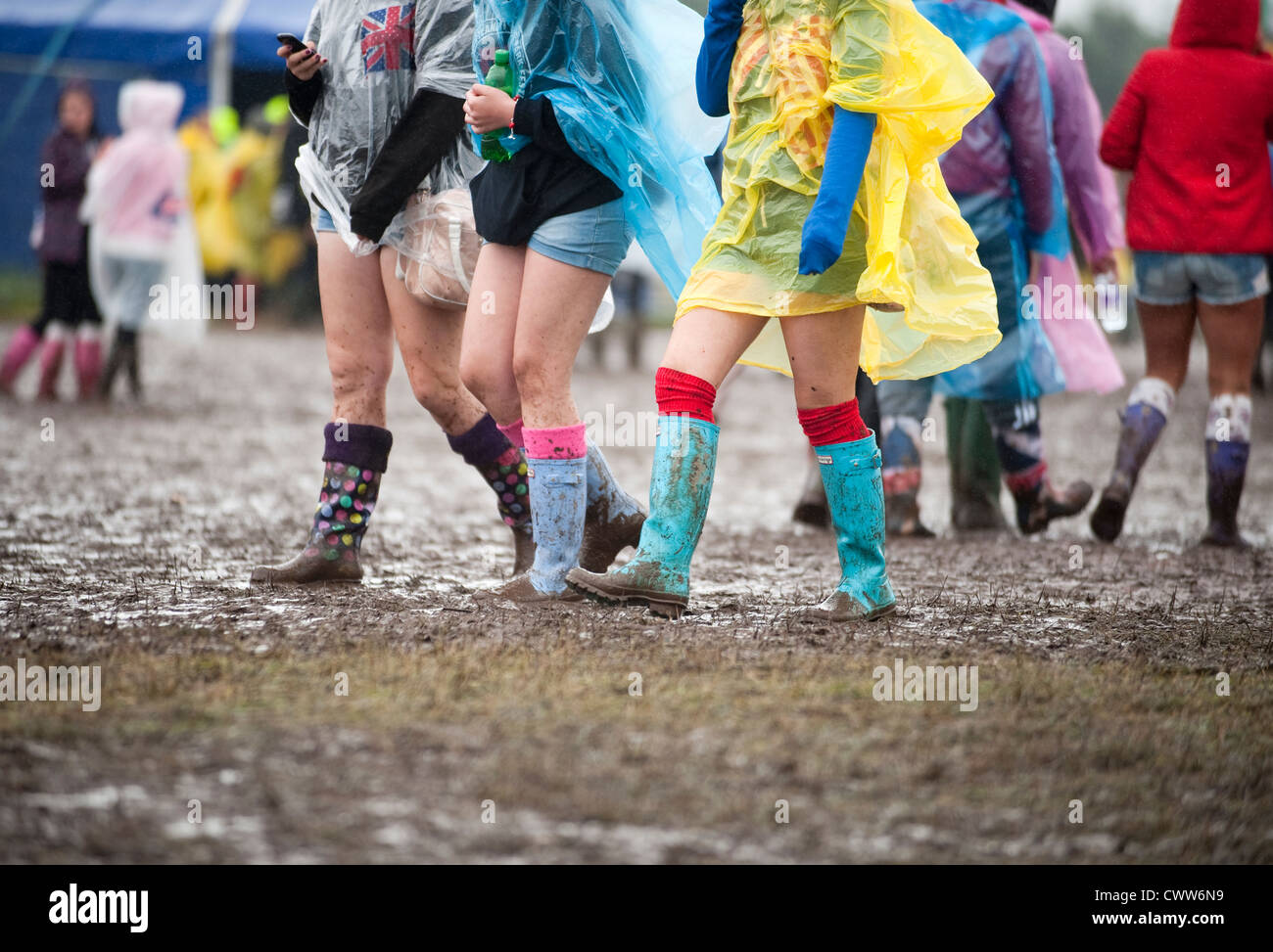 Rain poncho festival hi-res stock photography and images - Alamy