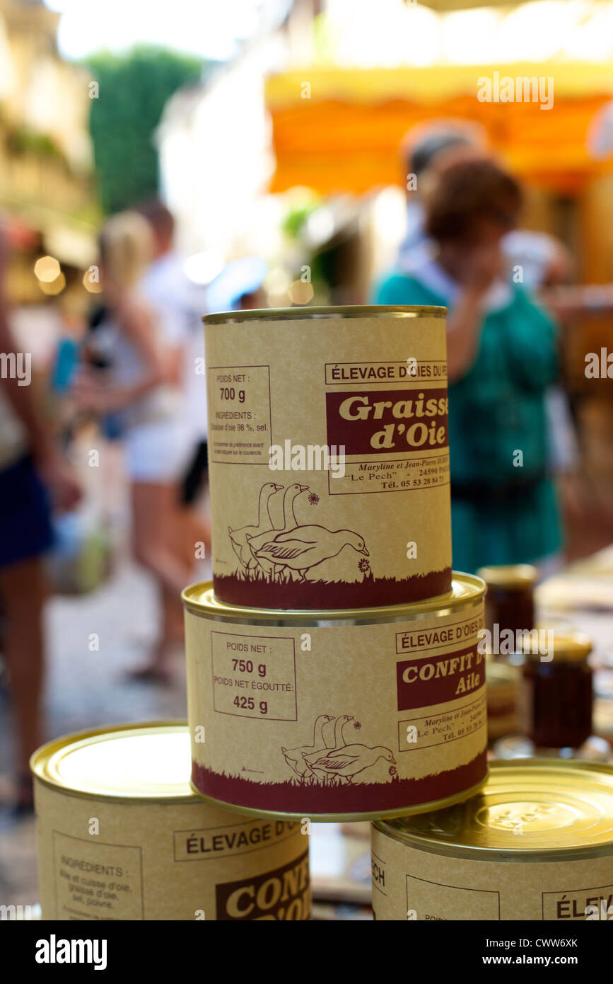 Tins of Foie Gras for sale at the busy farmers market in the perigord