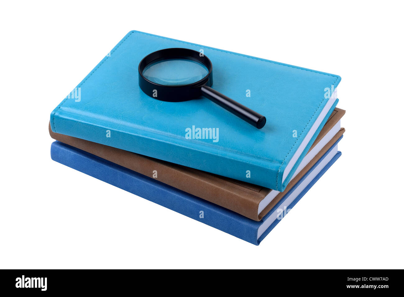Three Books and Magnifying Lens Isolated on White Background in Studio