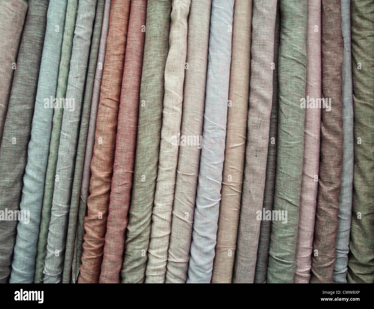 Piles of cotton linen fabric Stock Photo
