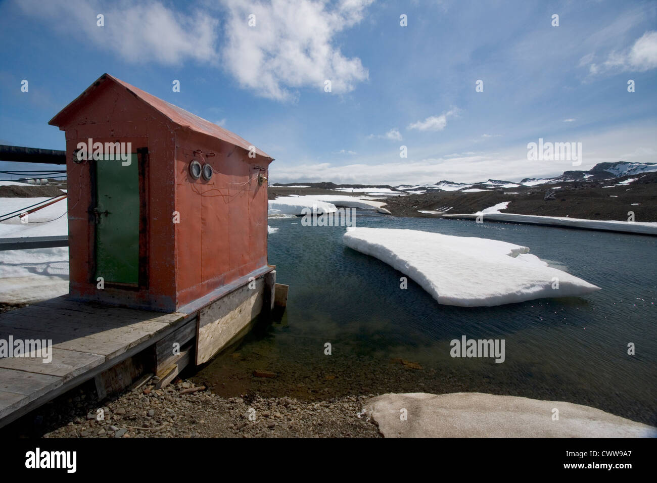 Hut or Out house on a jetty, near Bellingshausen station, Russian Antarctic research base, Antarctica Stock Photo