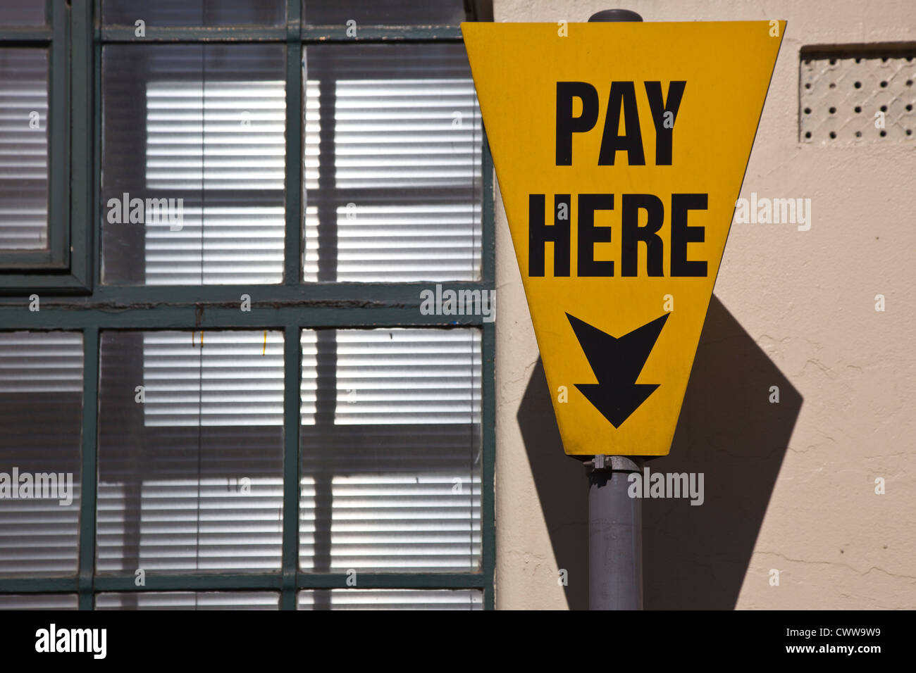 'Pay Here' sign indicates where to pay for Parking in London Stock Photo
