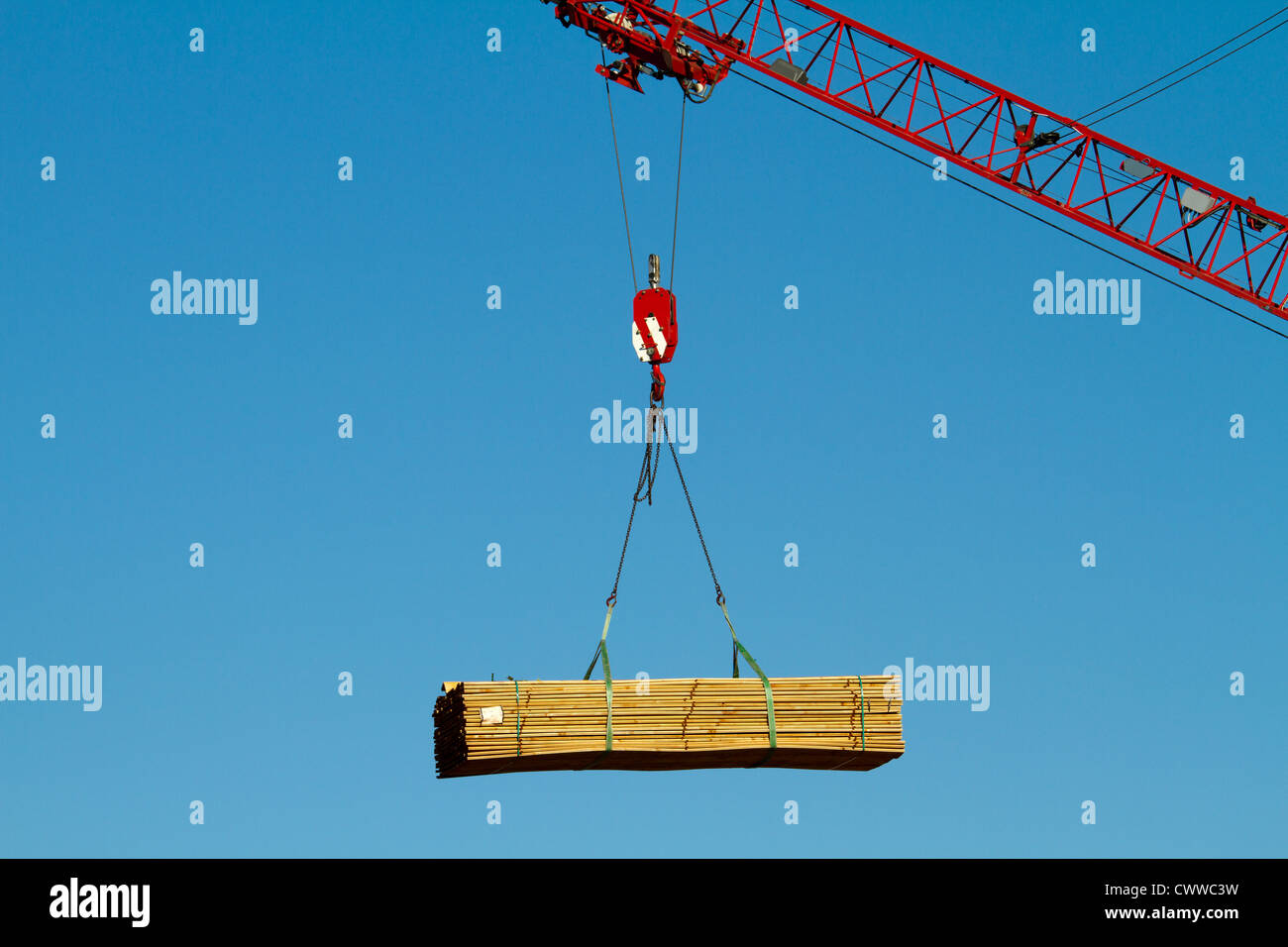 Wood supply with a crane Stock Photo