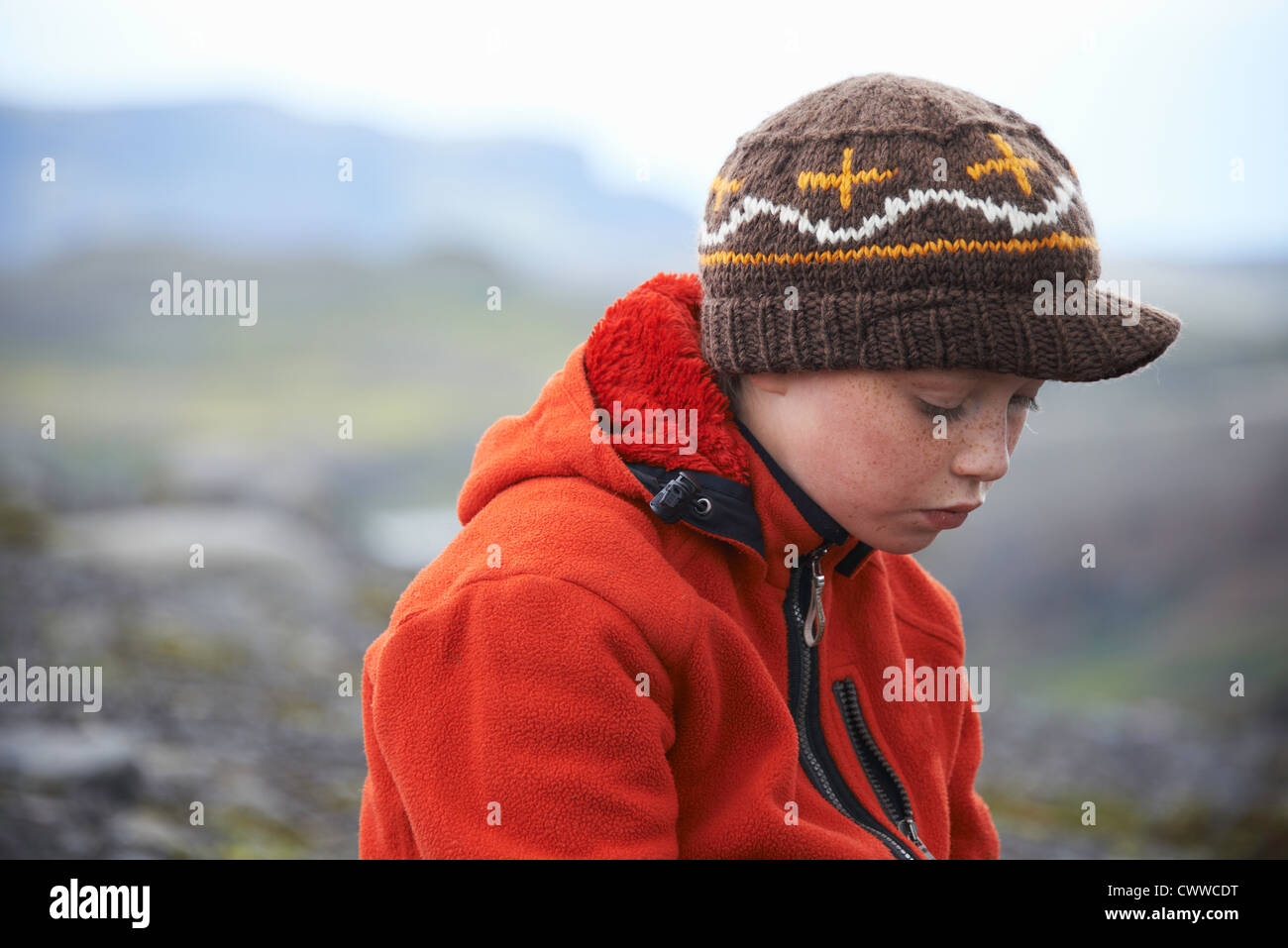 Girl wearing knitted cap outdoors Stock Photo