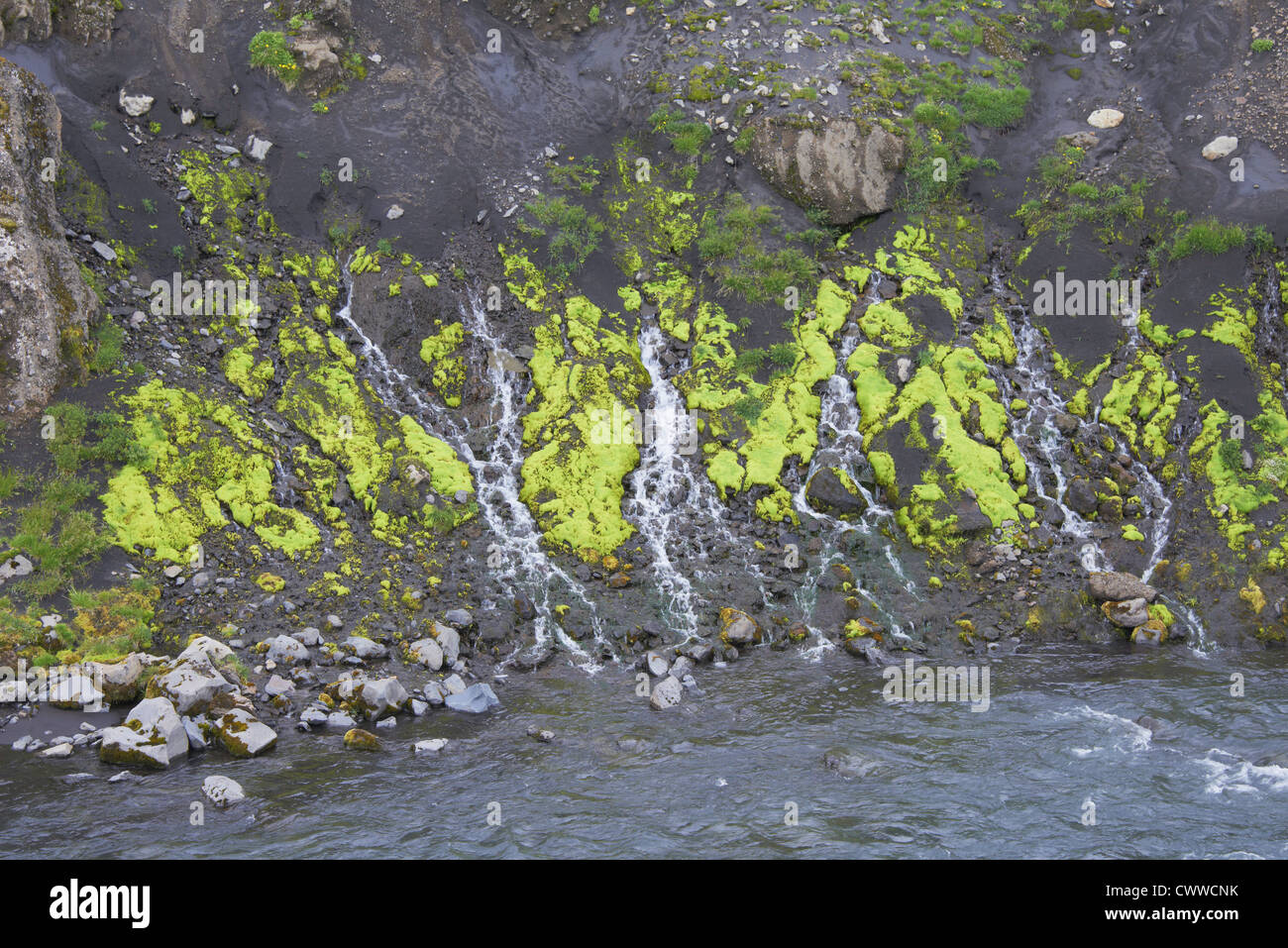 Frozen streams on rocky hillside Stock Photo