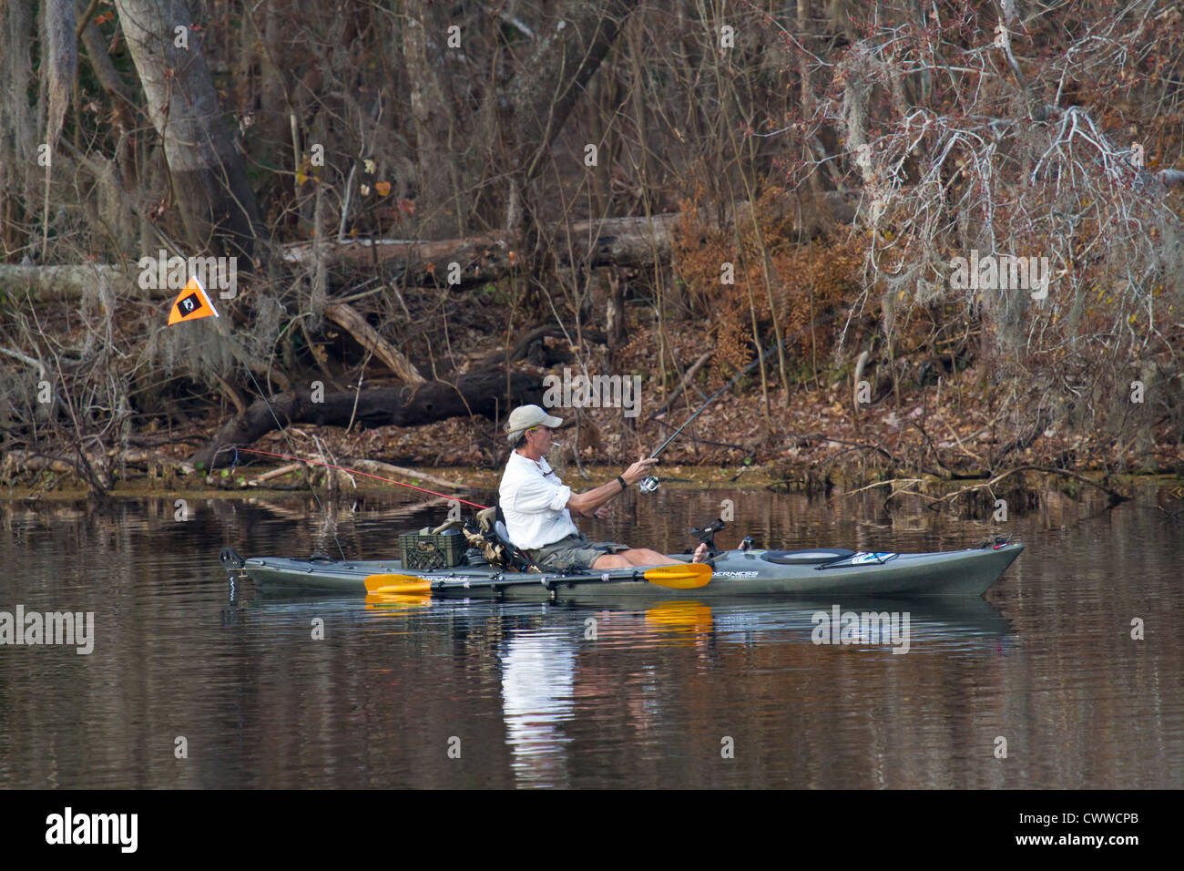 Man fishing from kayak on Withlacoochee River near Inverness, Florida