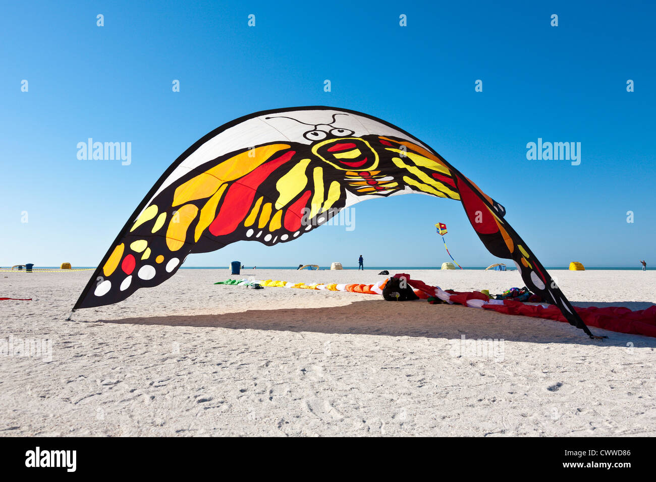 Large kite sitting on beach at the Treasure Island Kite Festival in Treasure Island, Florida Stock Photo