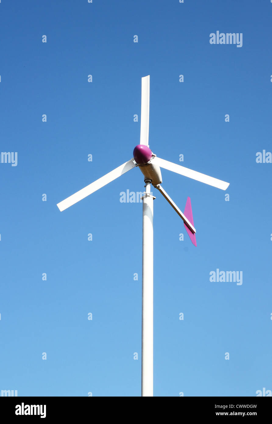 wind turbine on blue sky background Stock Photo - Alamy