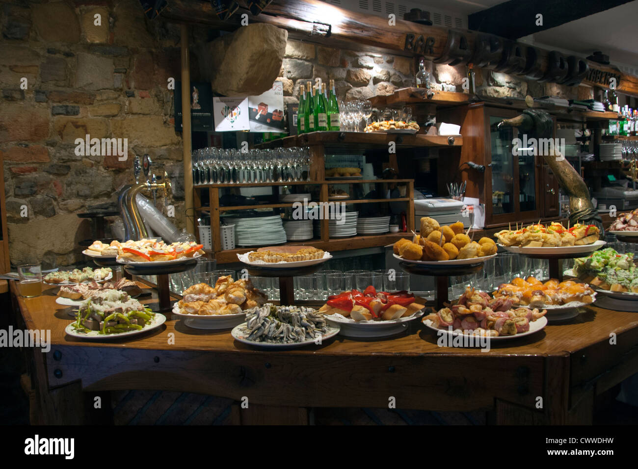 A selection of pintxos, or tapas, in a bar in San Sebastian's historic Old Town on Spain's Basque Coast. Stock Photo