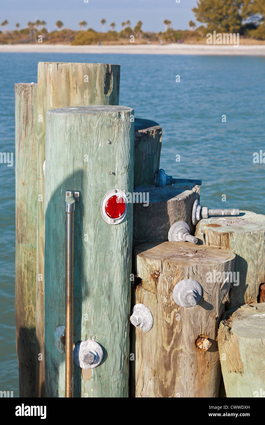 Wood pilings bolted together on dock in Fort De Soto county park in Tierra Verde, Florida Stock Photo